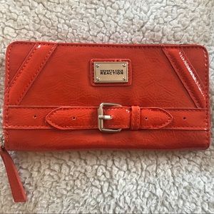 Small orange wrist wallet